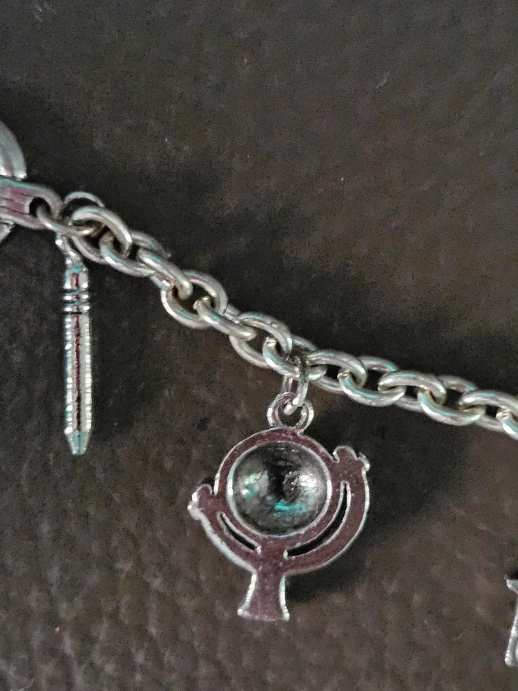 silver tone charm bracelet image indicator(2)