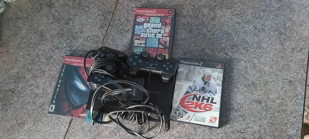 PlayStation 2 Bundle - Games and Controllers