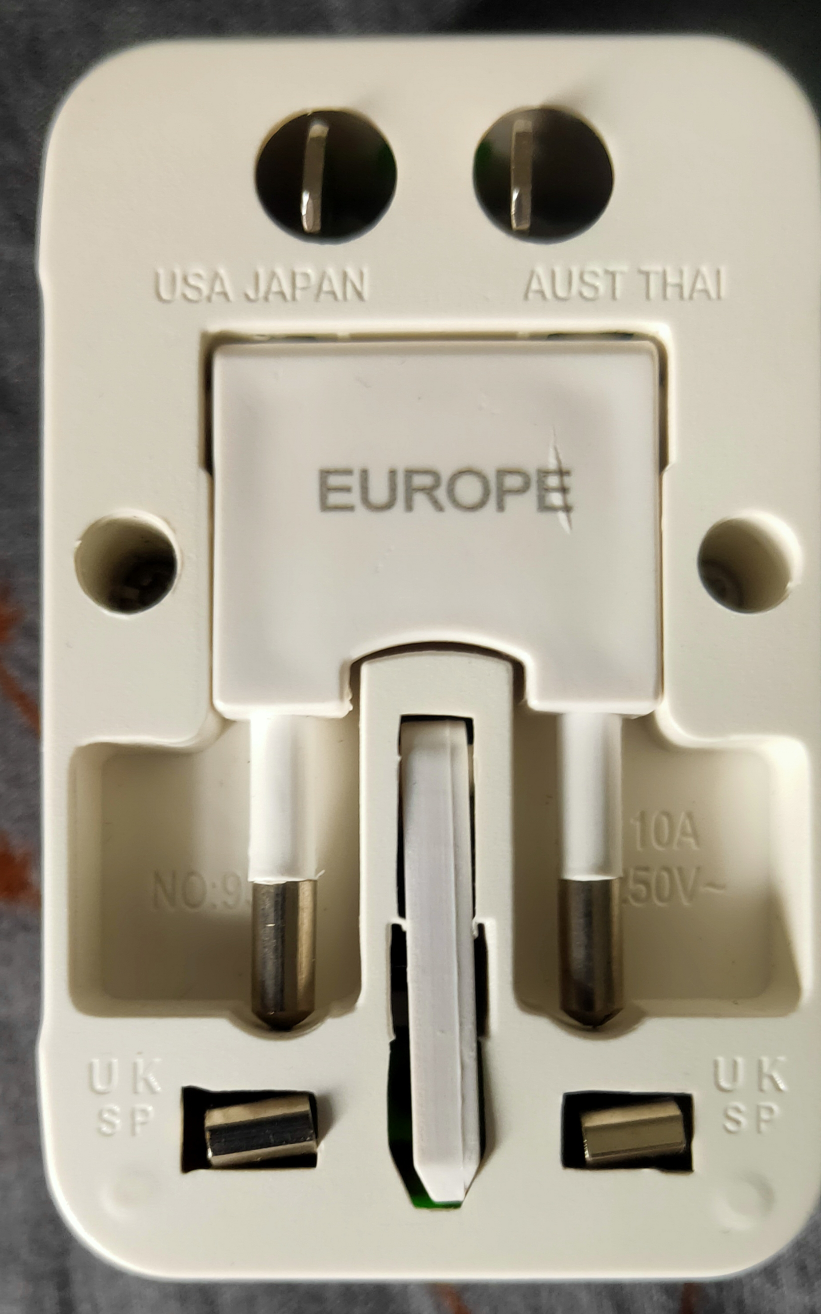 Universal Travel Adaptor with Surge Protector - photo 3