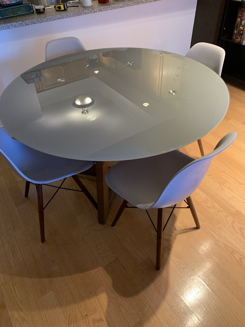 Glass dining table set with chairs