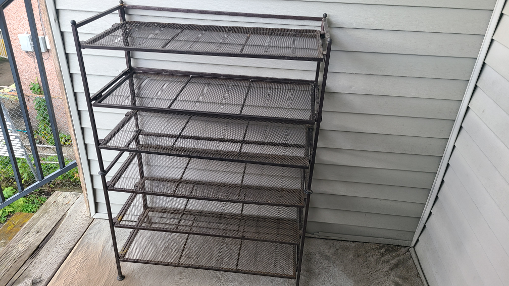 2 black metal shoe rack