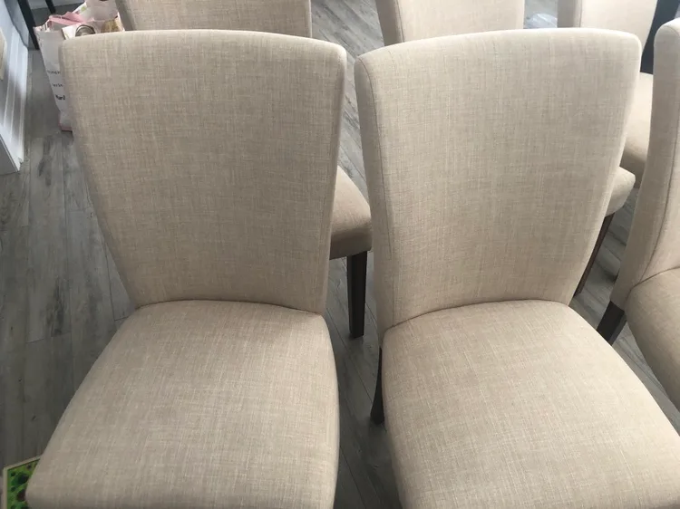 Six Beige Upholstered Dining Chairs image indicator(5)