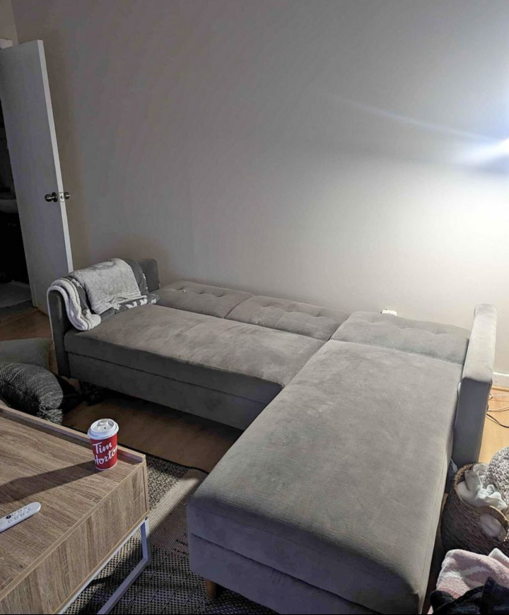 Dark grey reversible sleeper sectional sofa with storage - photo 2
