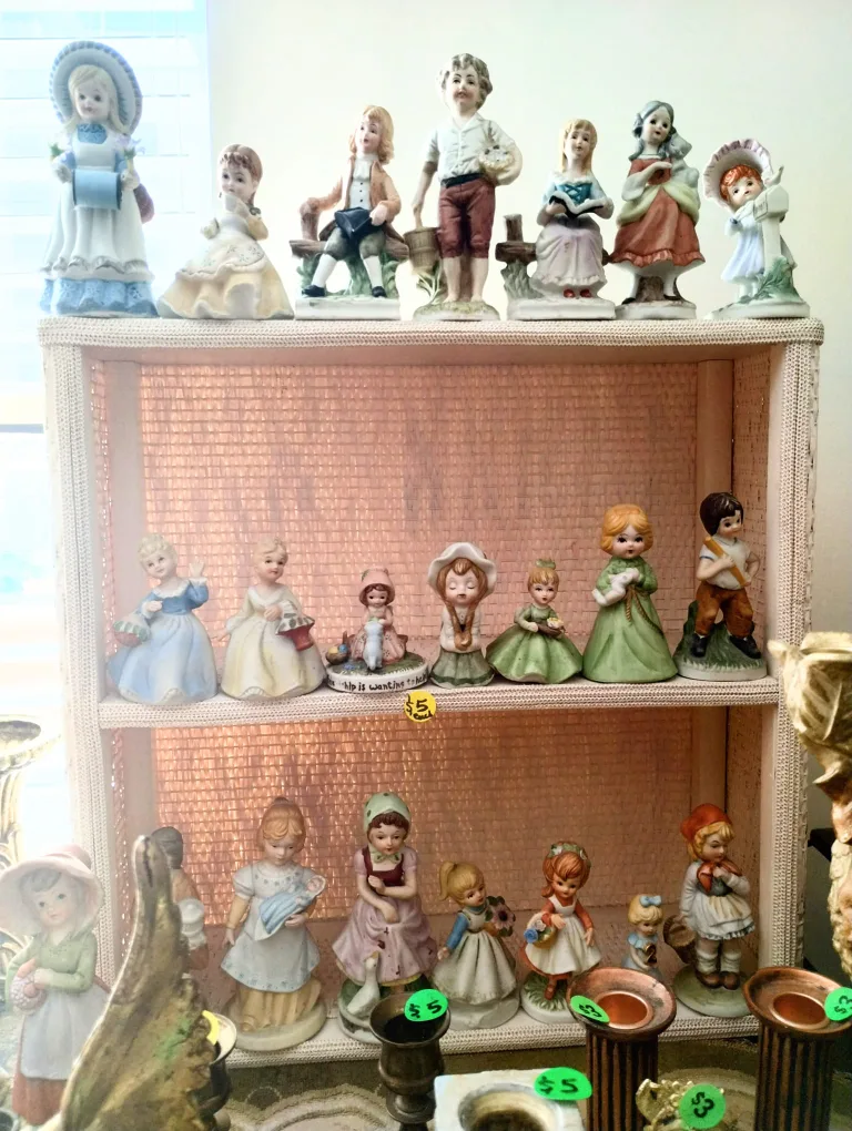 many antique porcelain figurines, statues on sale, $5, $10, $15. image indicator(8)