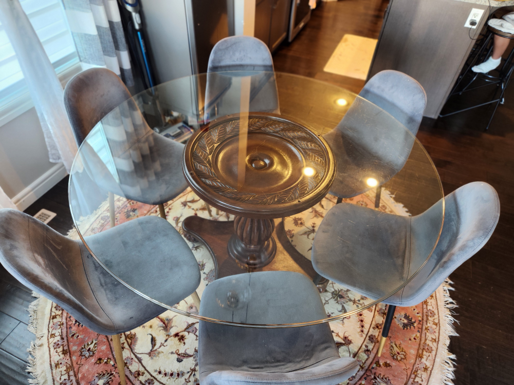 Glass dining table and six chairs