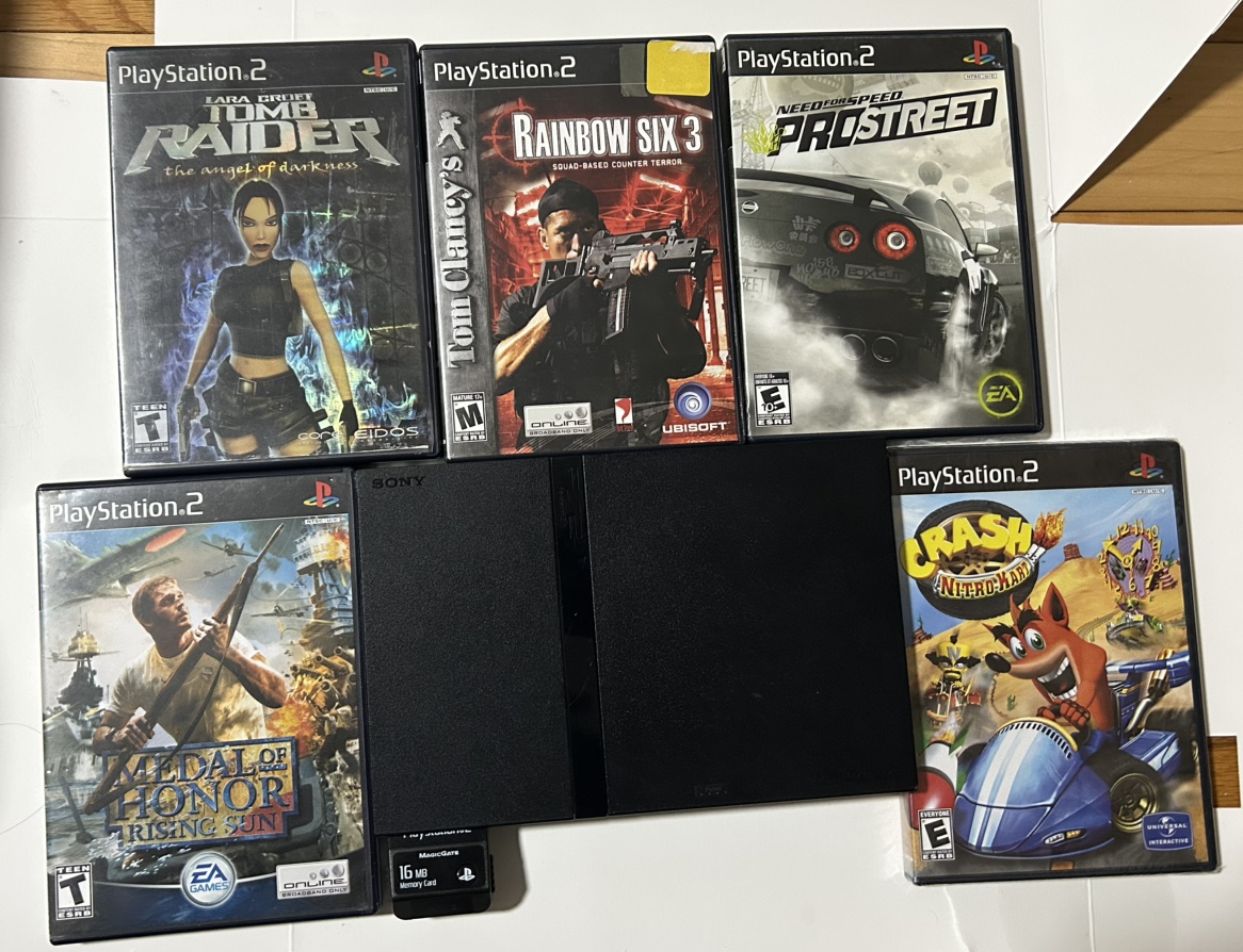 Sony PS2 slim Console with 5 games