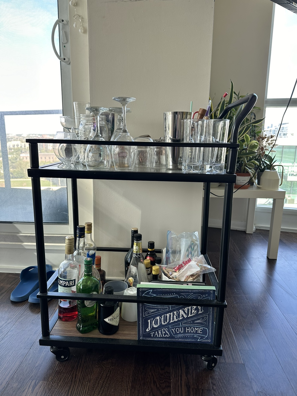 Bar cart, cocktails glasses, tools, kits