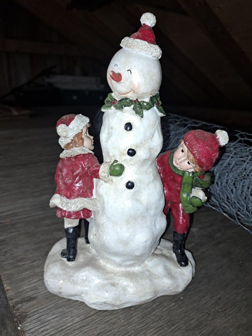 White Candles handle and Christmas figure