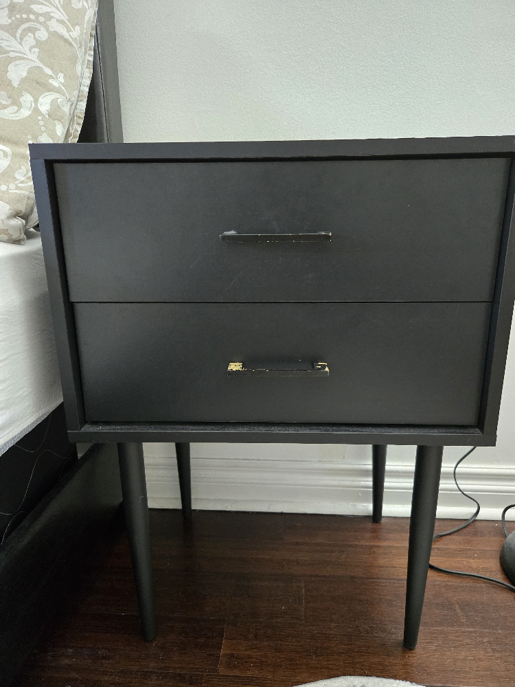 a set of 2 Black Nightstands with Two Drawers