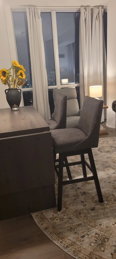 2 Brand new Ashley barstools.