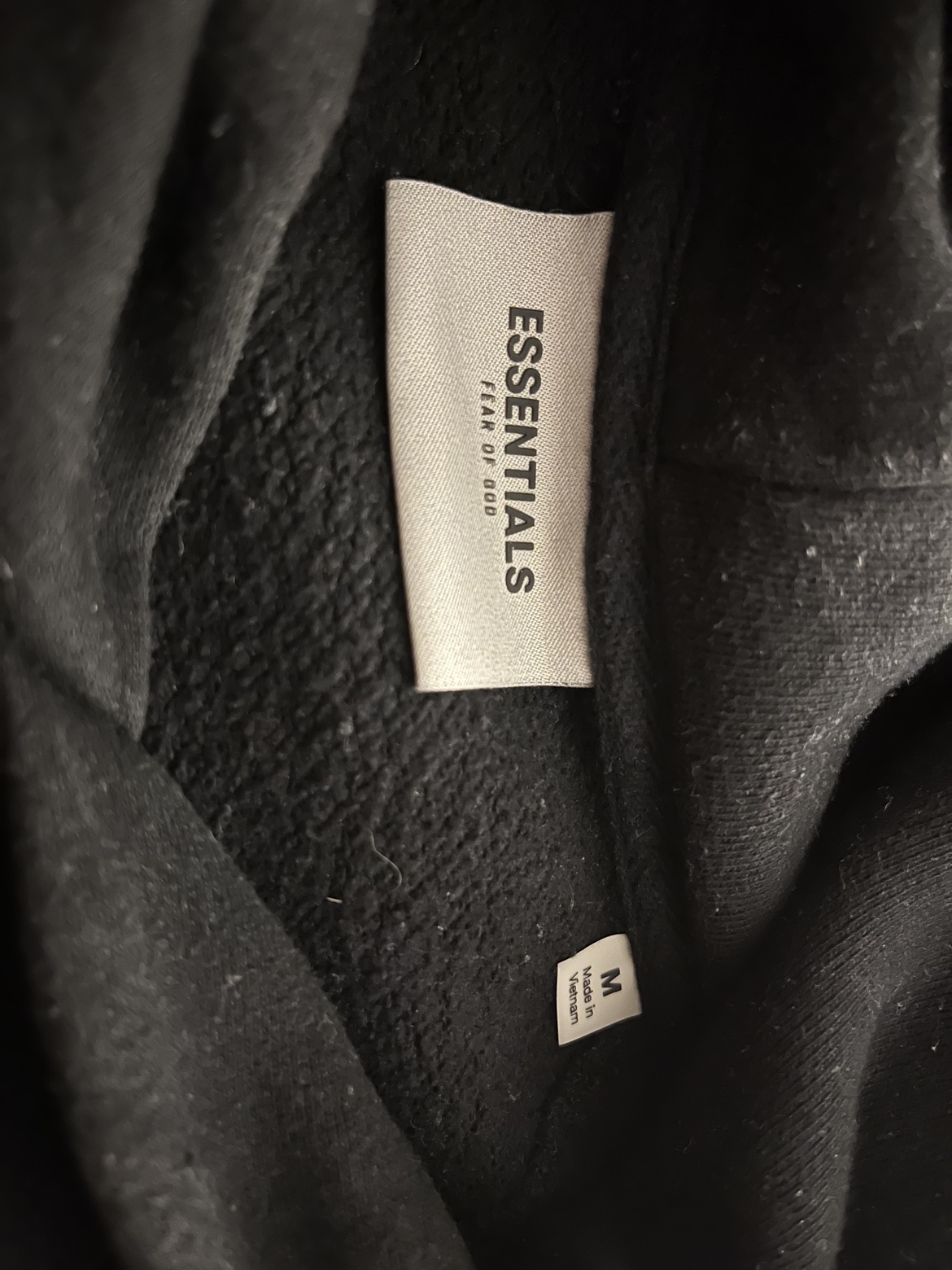 Fear of God Essentials Black Hoodie - photo 3