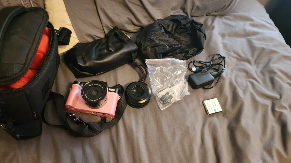 Pink Digital Camera with Accessories