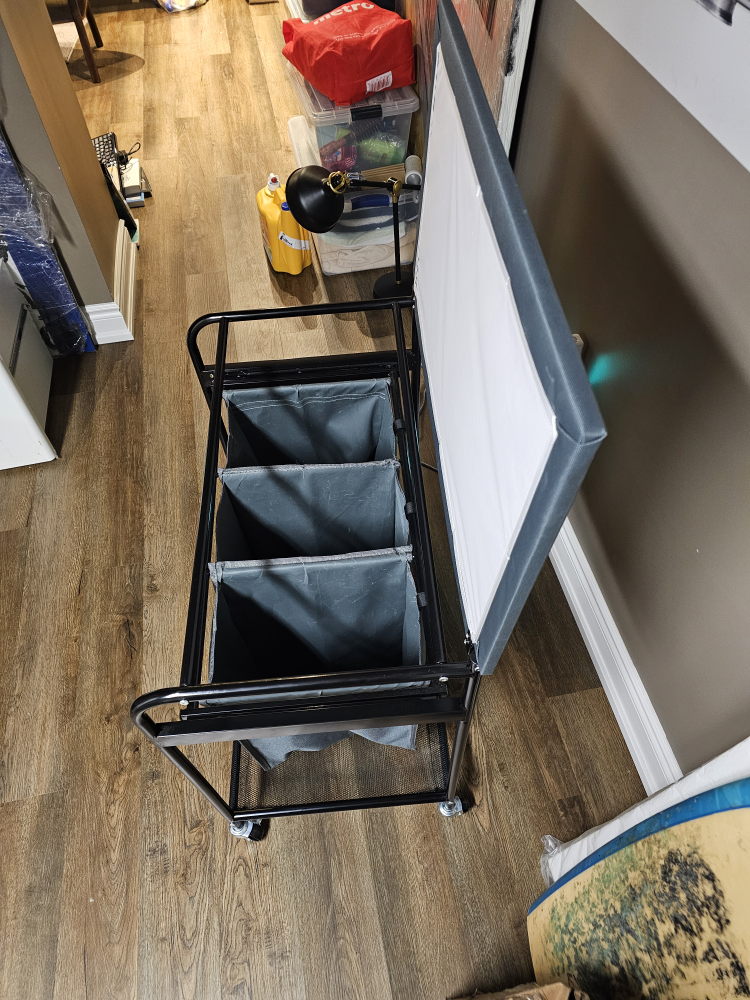Rolling Laundry Sorter with Ironing Board - photo 3