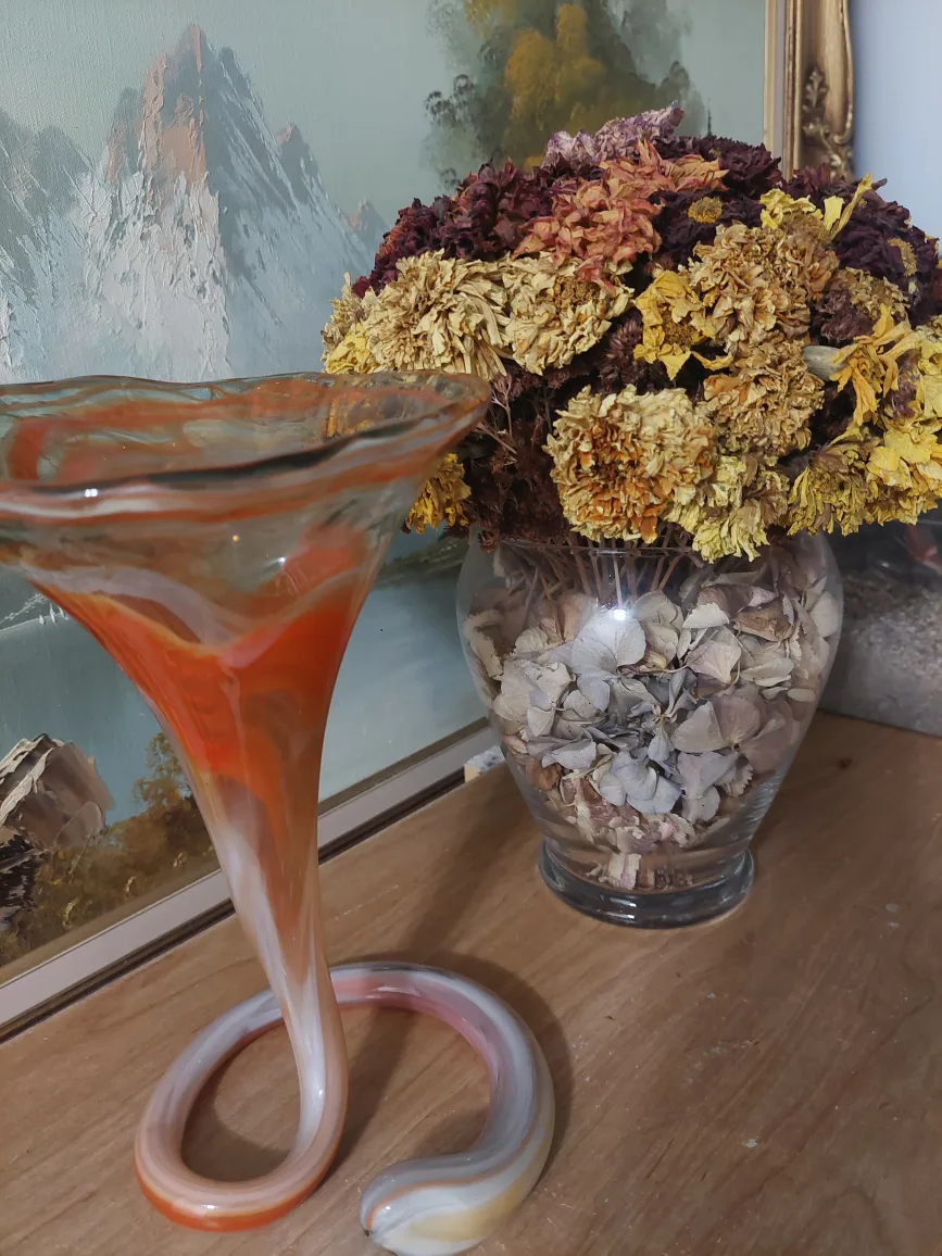Orange glass decor and glass vase with dried flowers. image indicator(2)