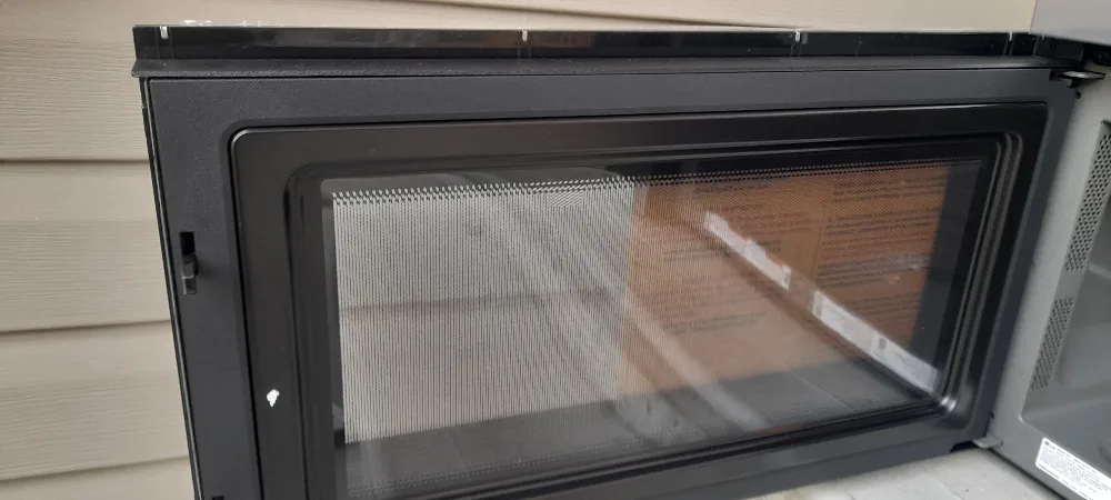 LG 1.7 cu. ft. Stainless-steel Over-the-range Microwave image indicator(2)