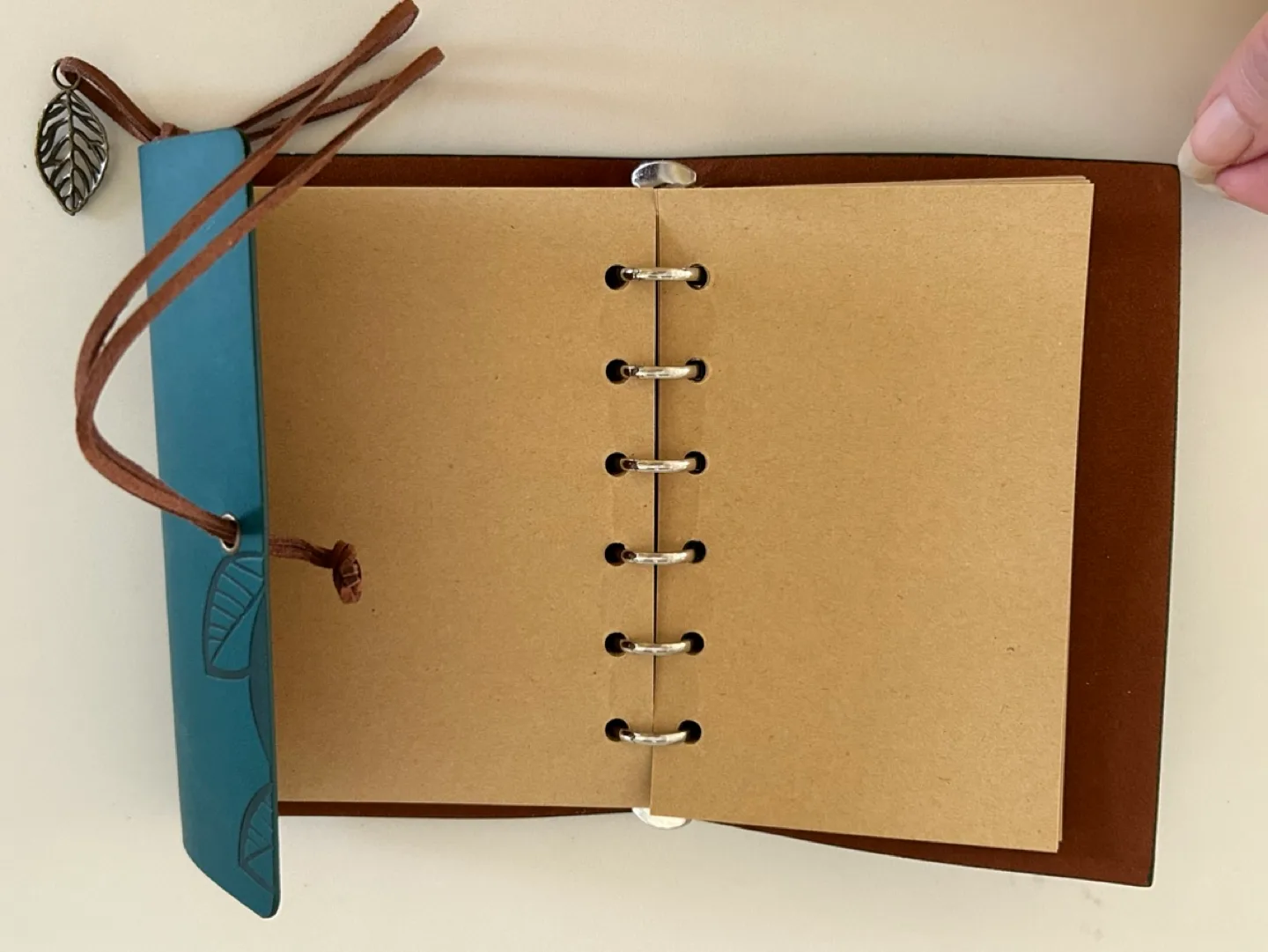 Teal Leather Journal with Leaf Design image indicator(2)