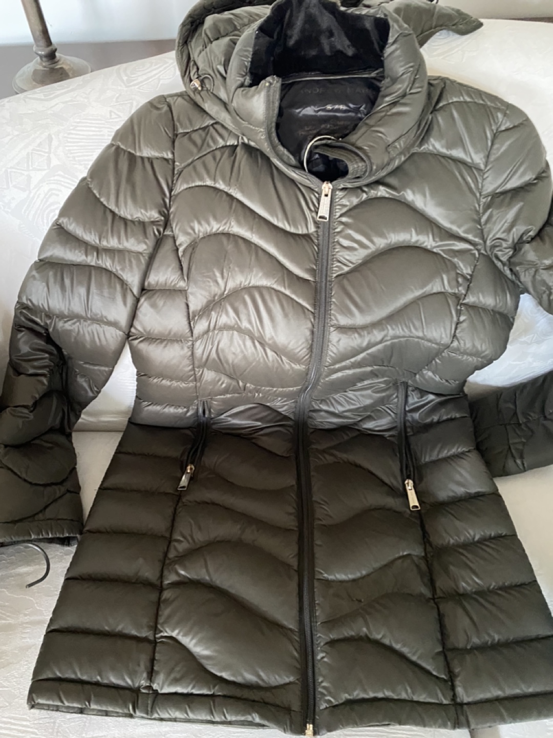 Two puffer jackets