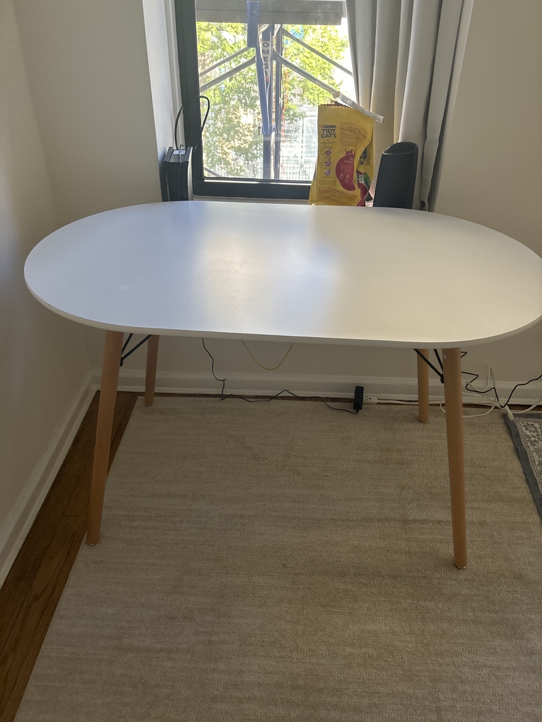 White Oval Dining Table with Wooden Legs