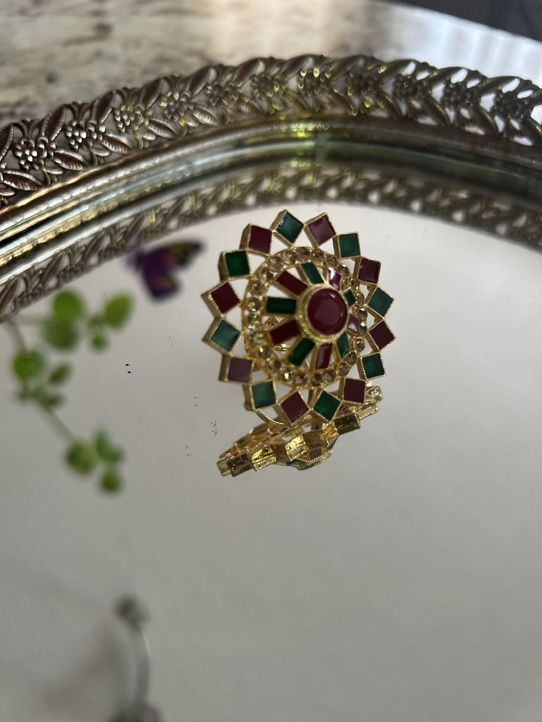 Gold Tone new ladies ring with emerald kundan style