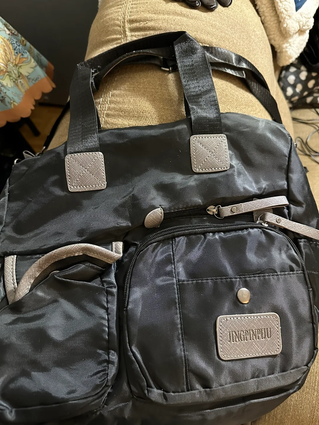 Black shoulder bag with multiple pockets thumbnail
