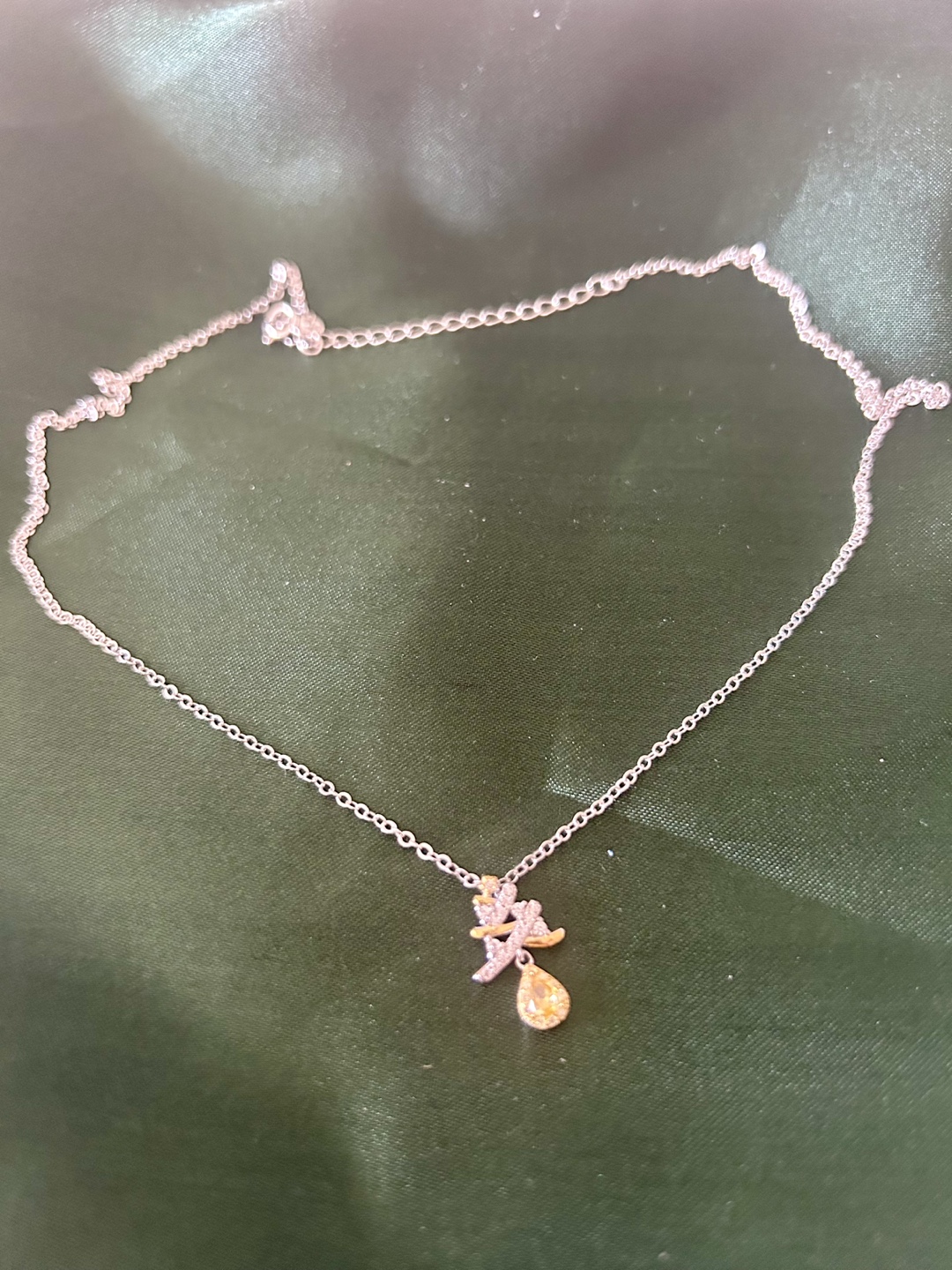 Silver necklace with a Christmas tree pendant