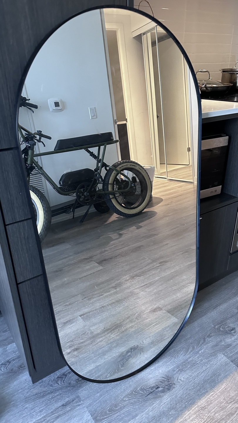 Full-length oval mirror
