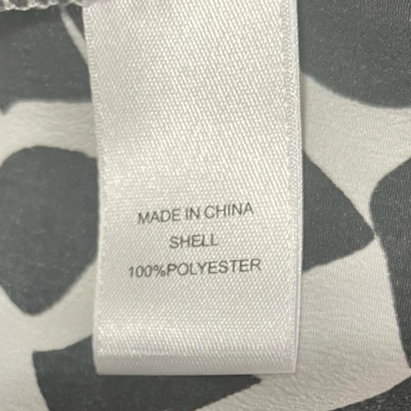 CeCe A-Line Shift Dress White w/Black Patterns with Tie Neck image indicator(10)