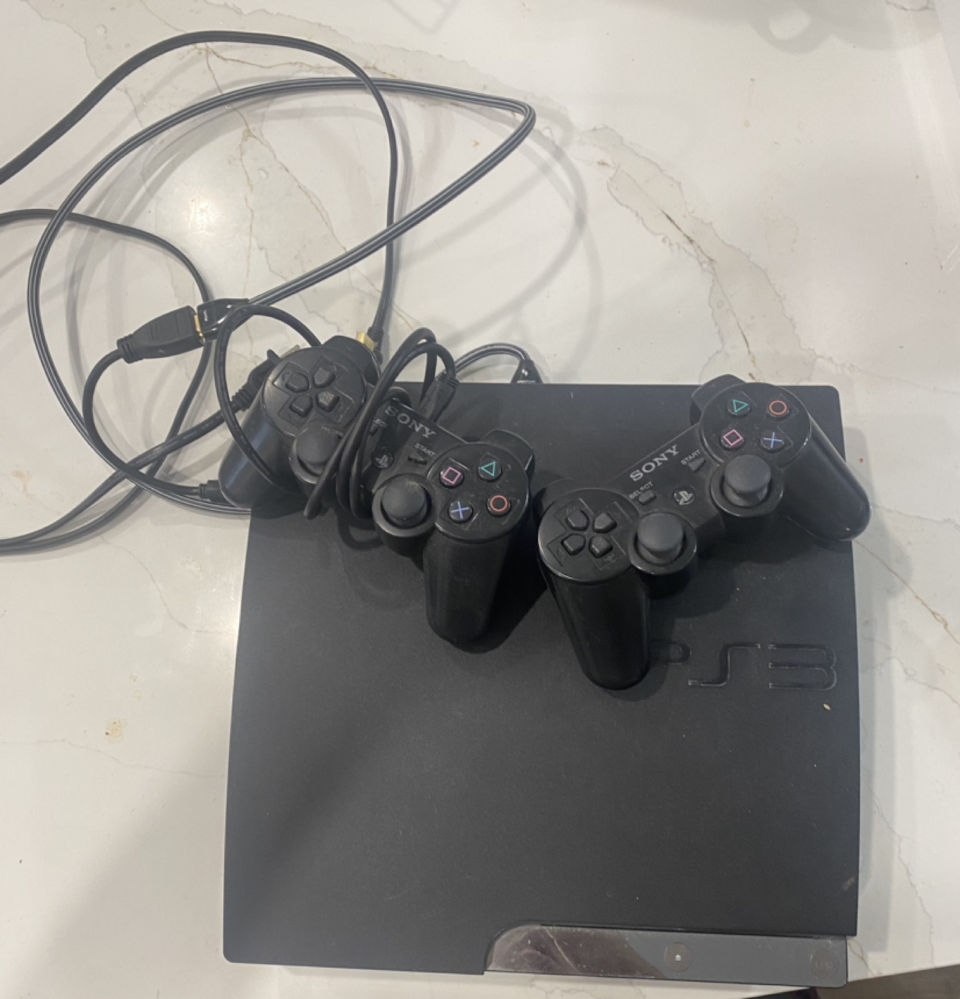 PS3 Console with 2 Controllers and 9 Games