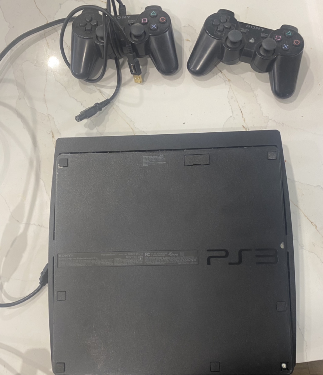PS3 Console with 2 Controllers and 9 Games - photo 2