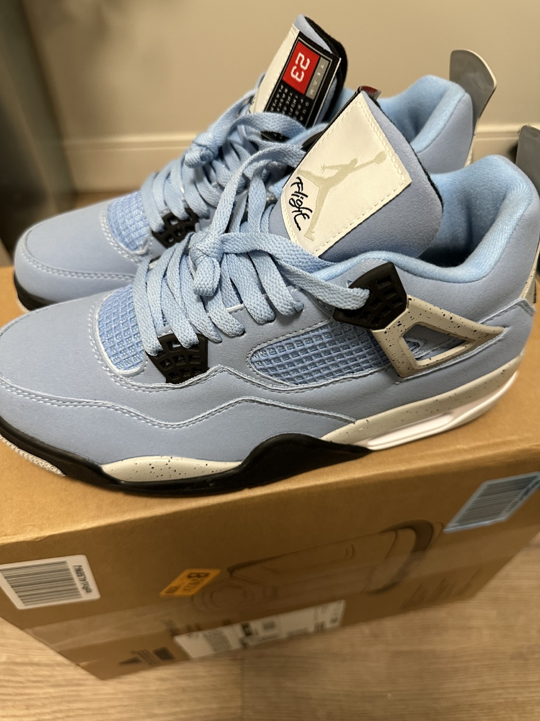 Jordan 4 University Blues