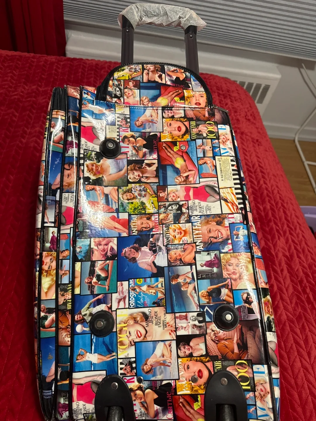 Rolling Suitcase with Vanity Fair Print image indicator(5)