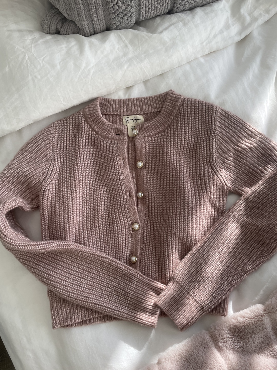 Pink knit cardigan