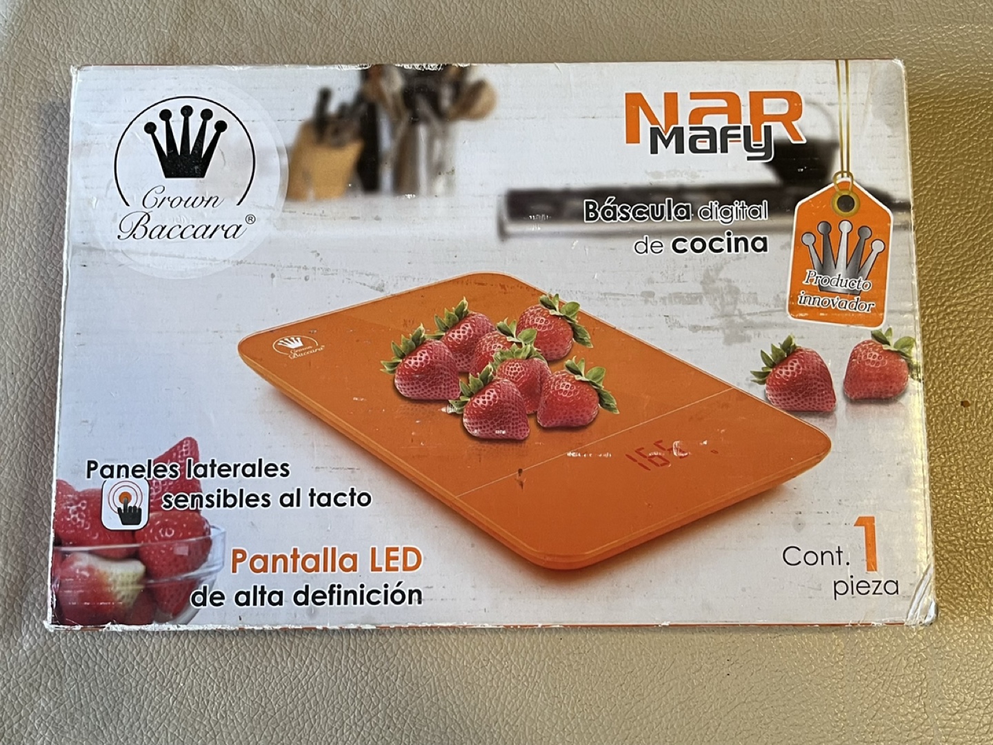 Orange electronic Scale for kitchen.