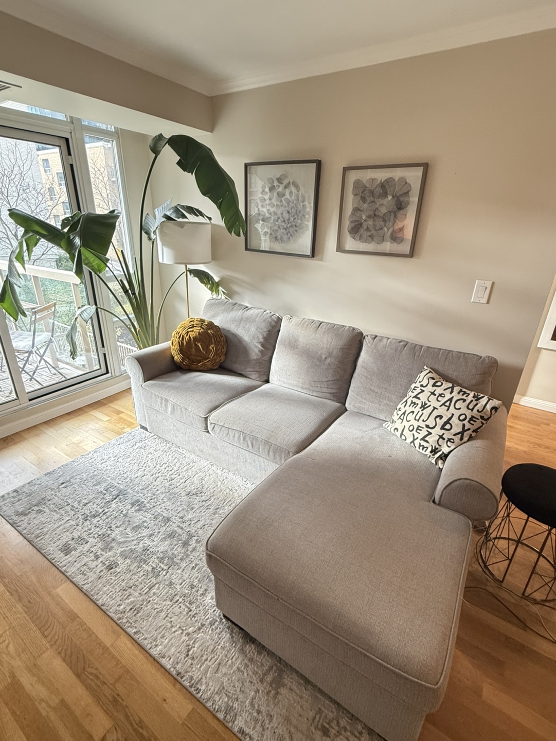 Grey sectional sofa with pull-out bed & large storage feature - photo 2