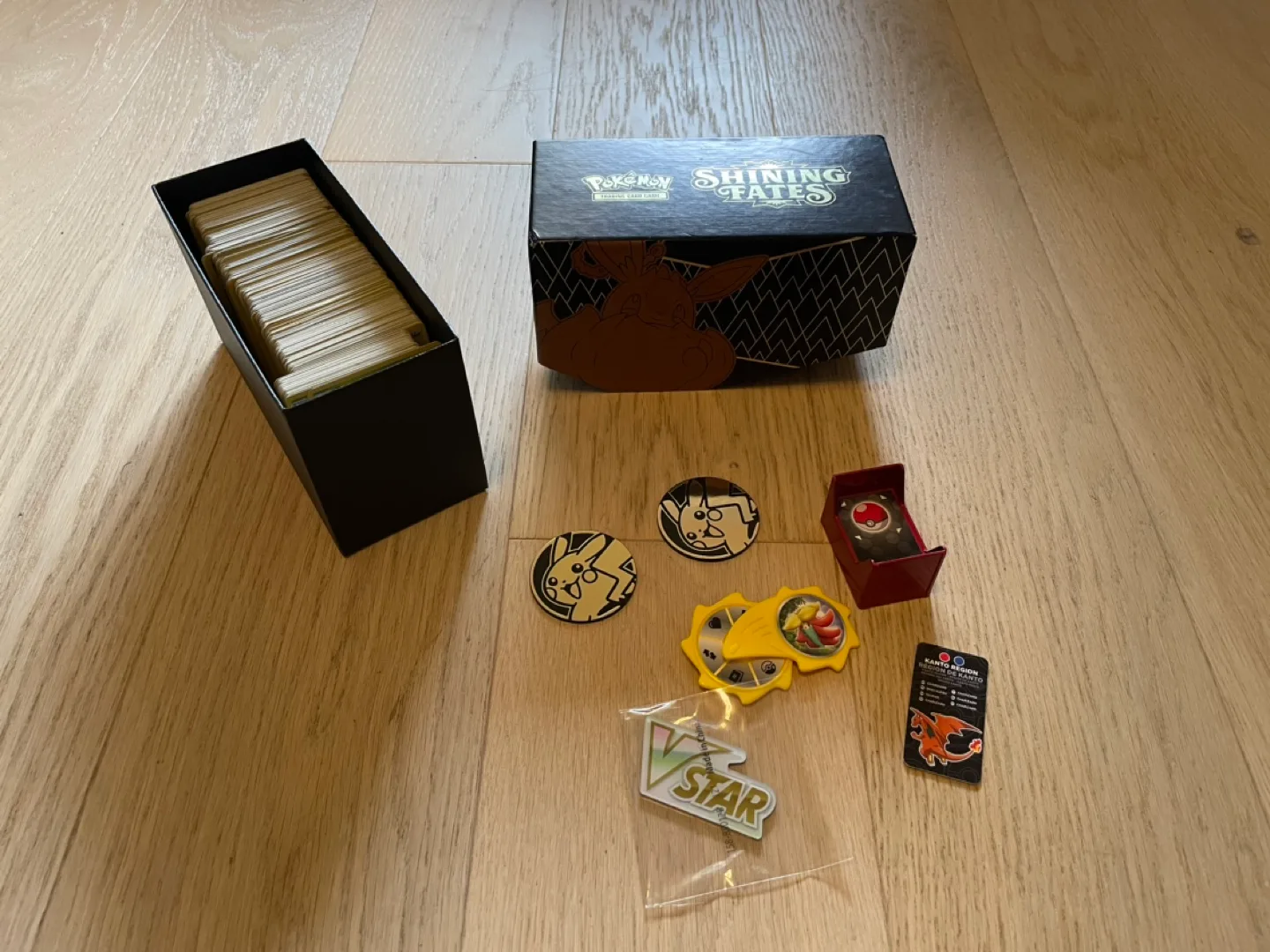 Pokemon Box full of cards with Promos and coins thumbnail