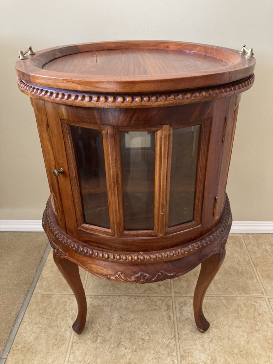 Round Wooden Table with Glass Doors