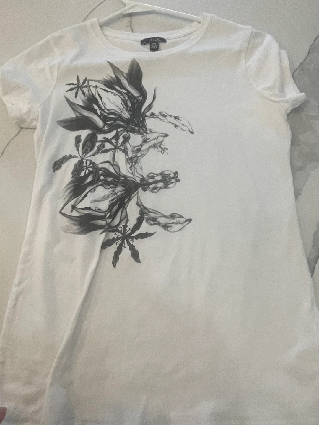 White T-shirt with Peace Sign Graphic image indicator(2)