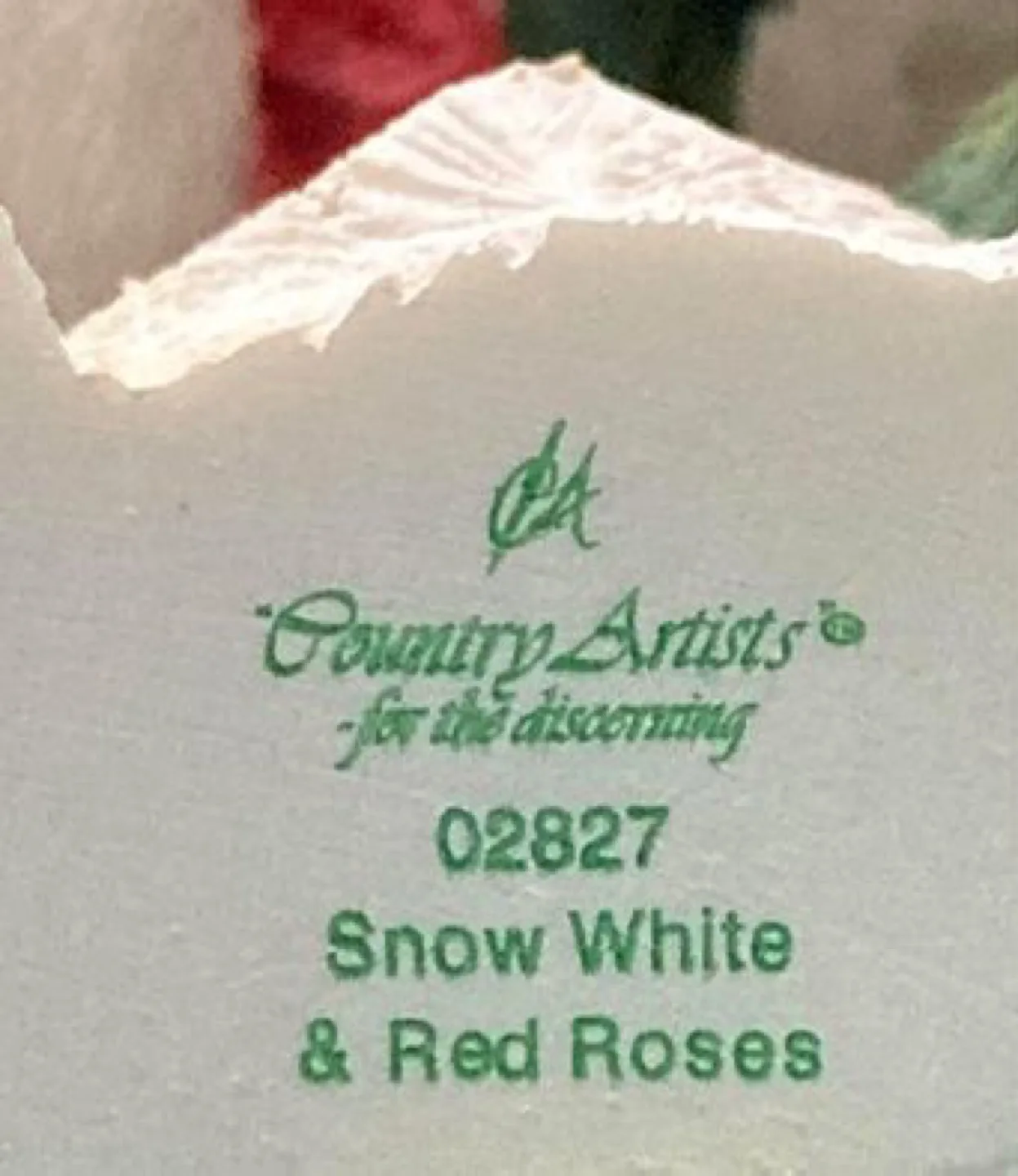 White Kitten Figurine Holding a Rose image indicator(7)