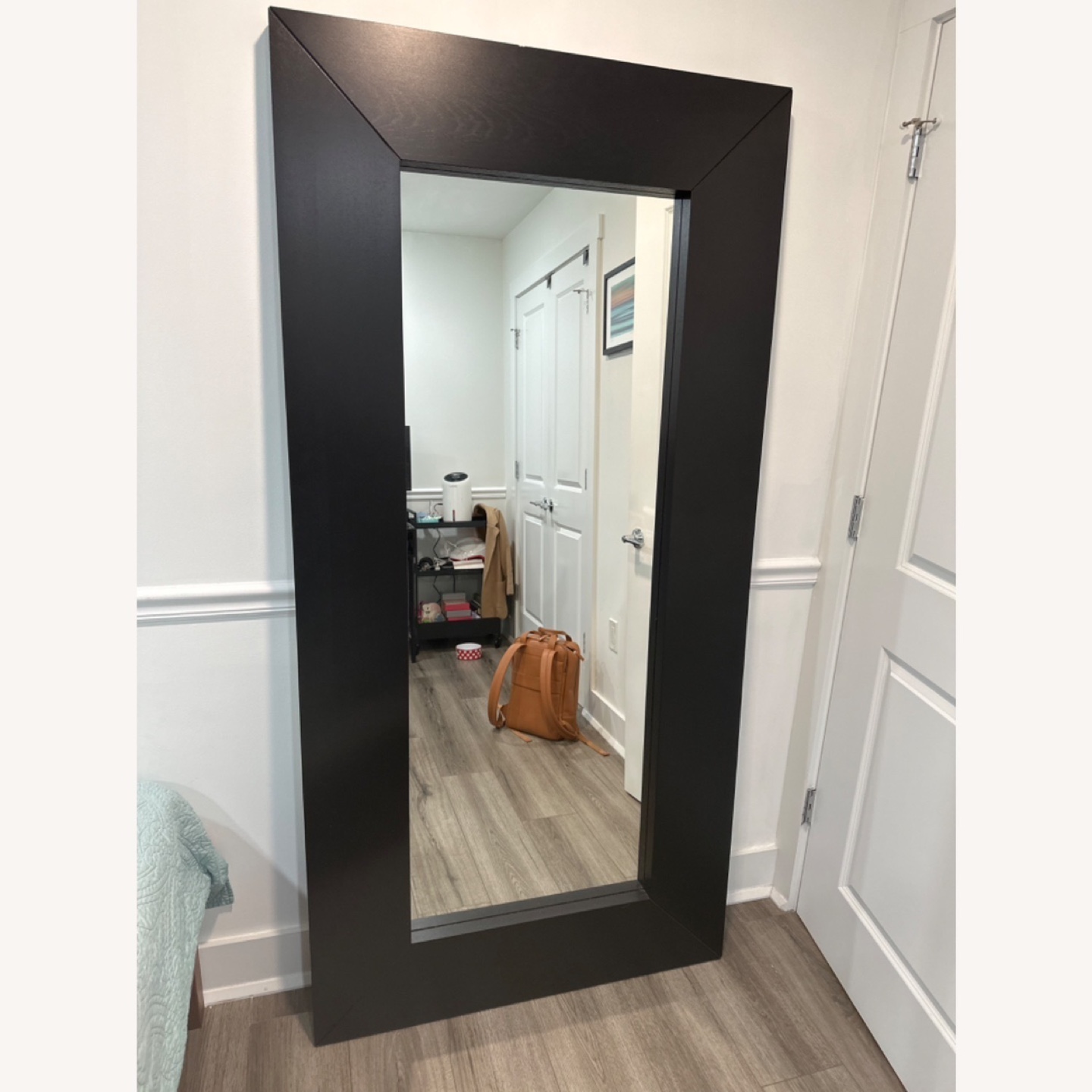 Full-length mirror with black frame