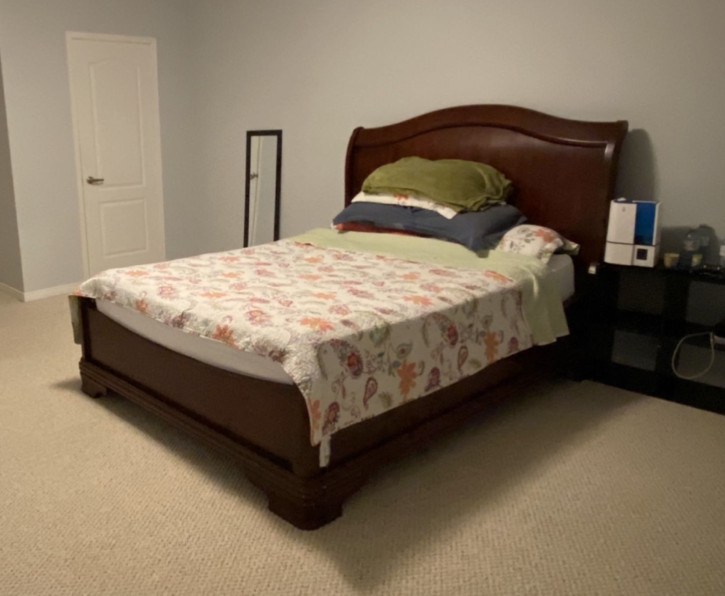 Queen bed frame includes mattress and box spring