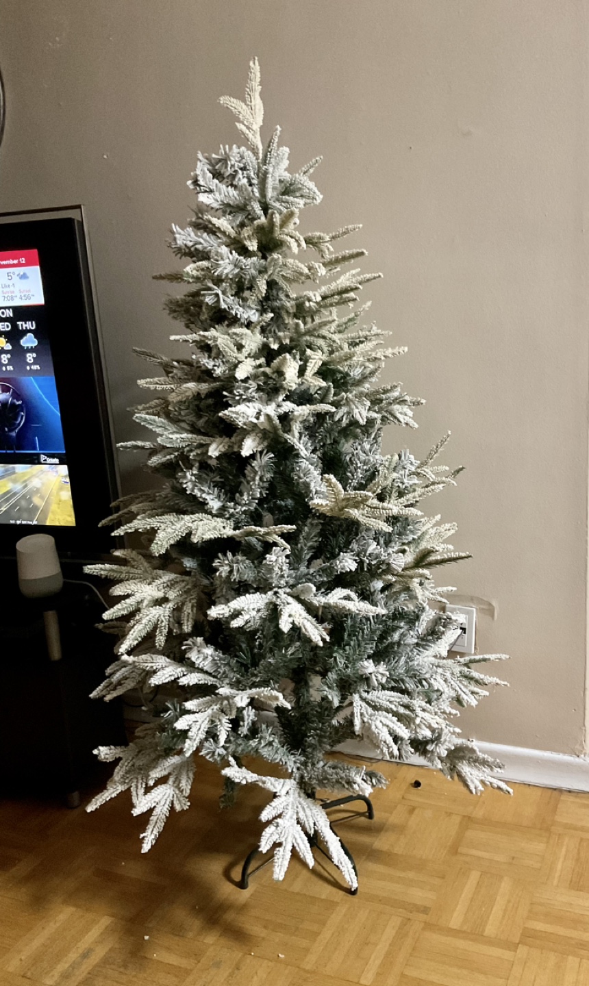 Snow-Flocked Artificial Christmas Tree