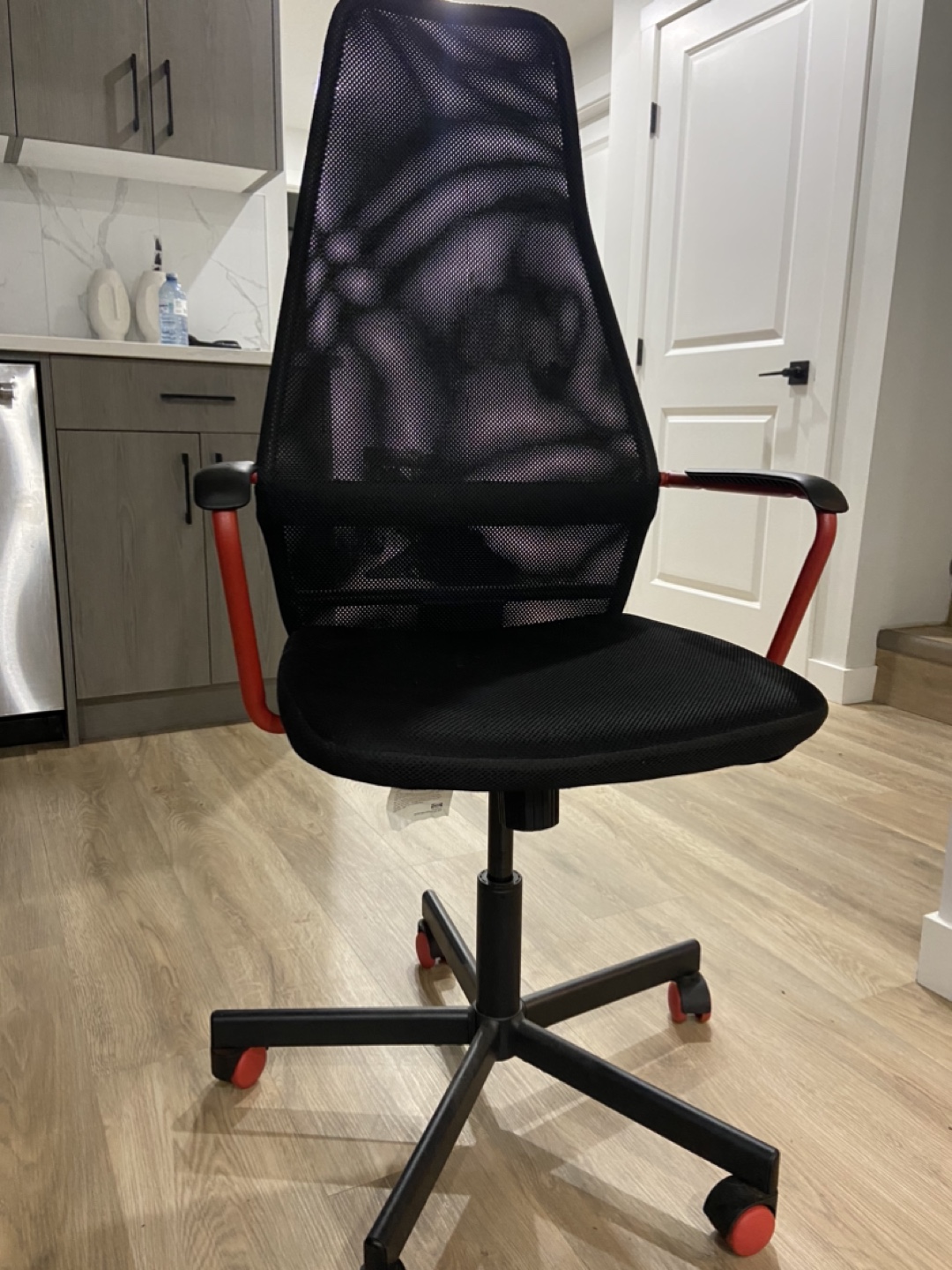 Black Mesh Office Chair with Red Accents
