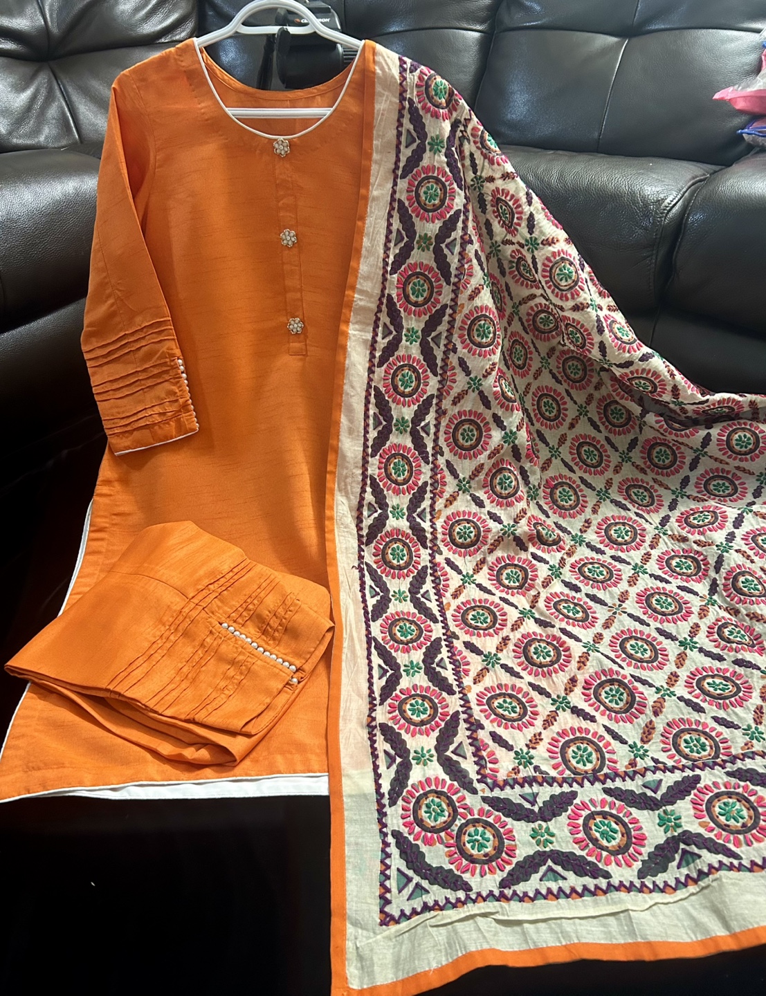 Orange 3 piece suit with hand made pulkari dupatta