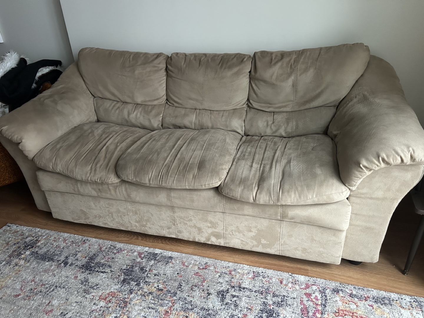 Beige three seat couch