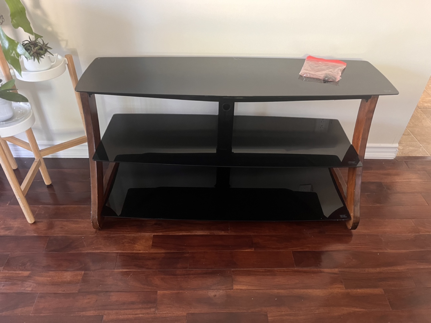 Black Glass TV Stand with Wood Accents