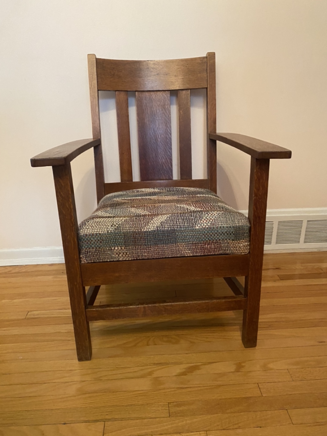 old fashion wooden chair with tight weave fabric -