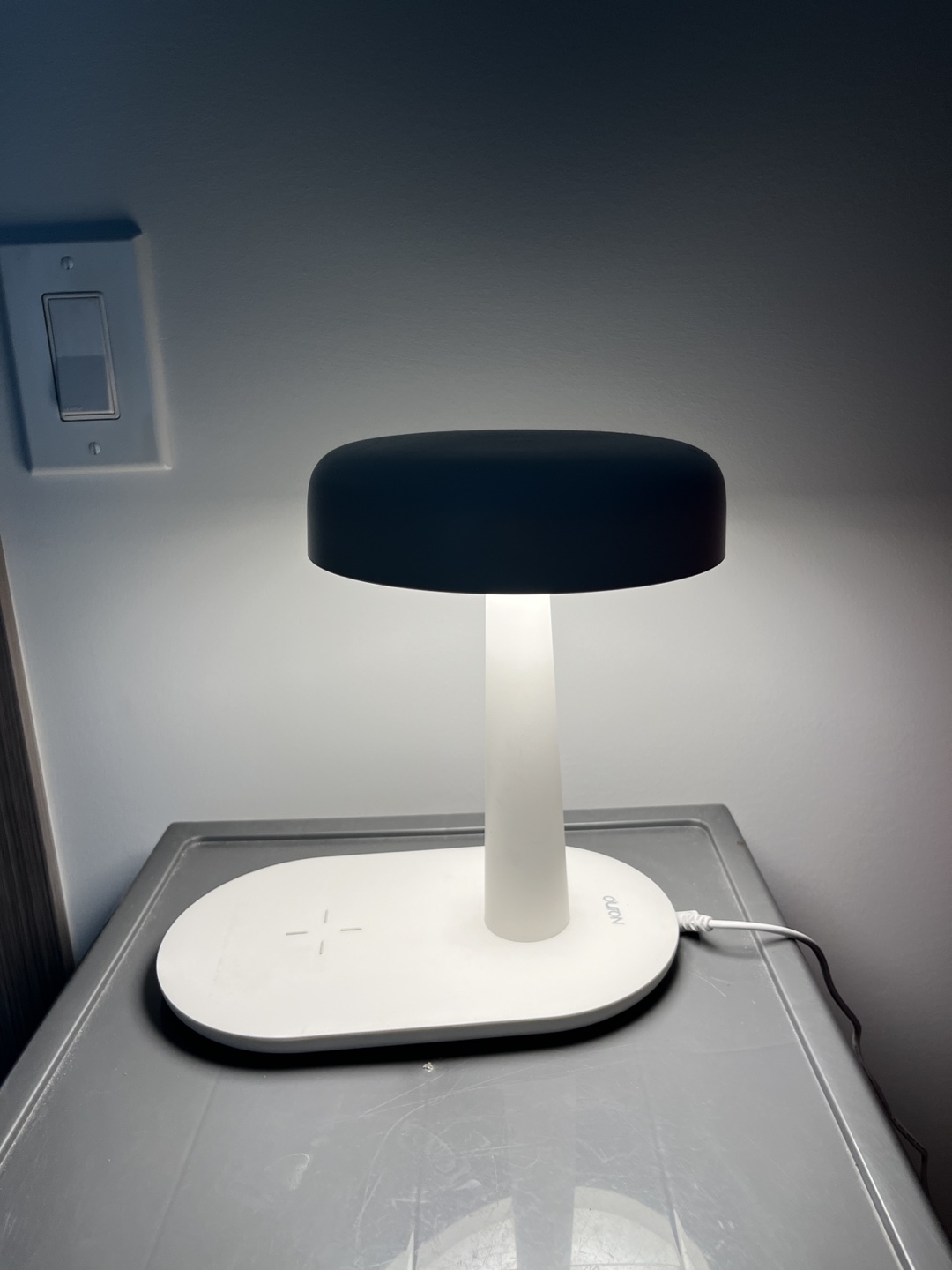 LED lamp with wireless charging pad