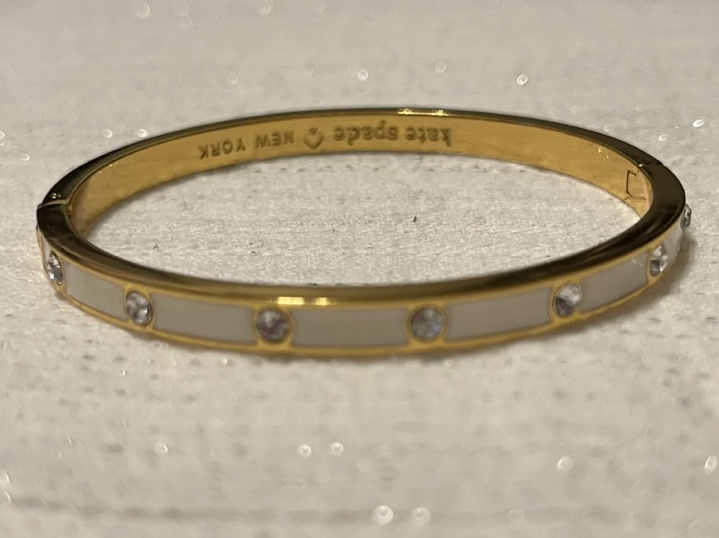 Kate Spade New York Gold Hinged Bangle Bracelet image indicator(5)