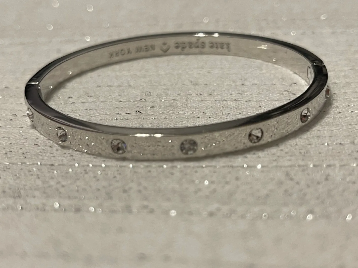 Kate Spade New York Gold Hinged Bangle Bracelet image indicator(6)