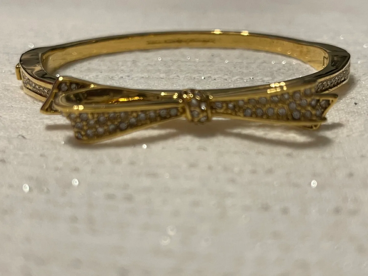 Kate Spade New York Gold Hinged Bangle Bracelet image indicator(7)